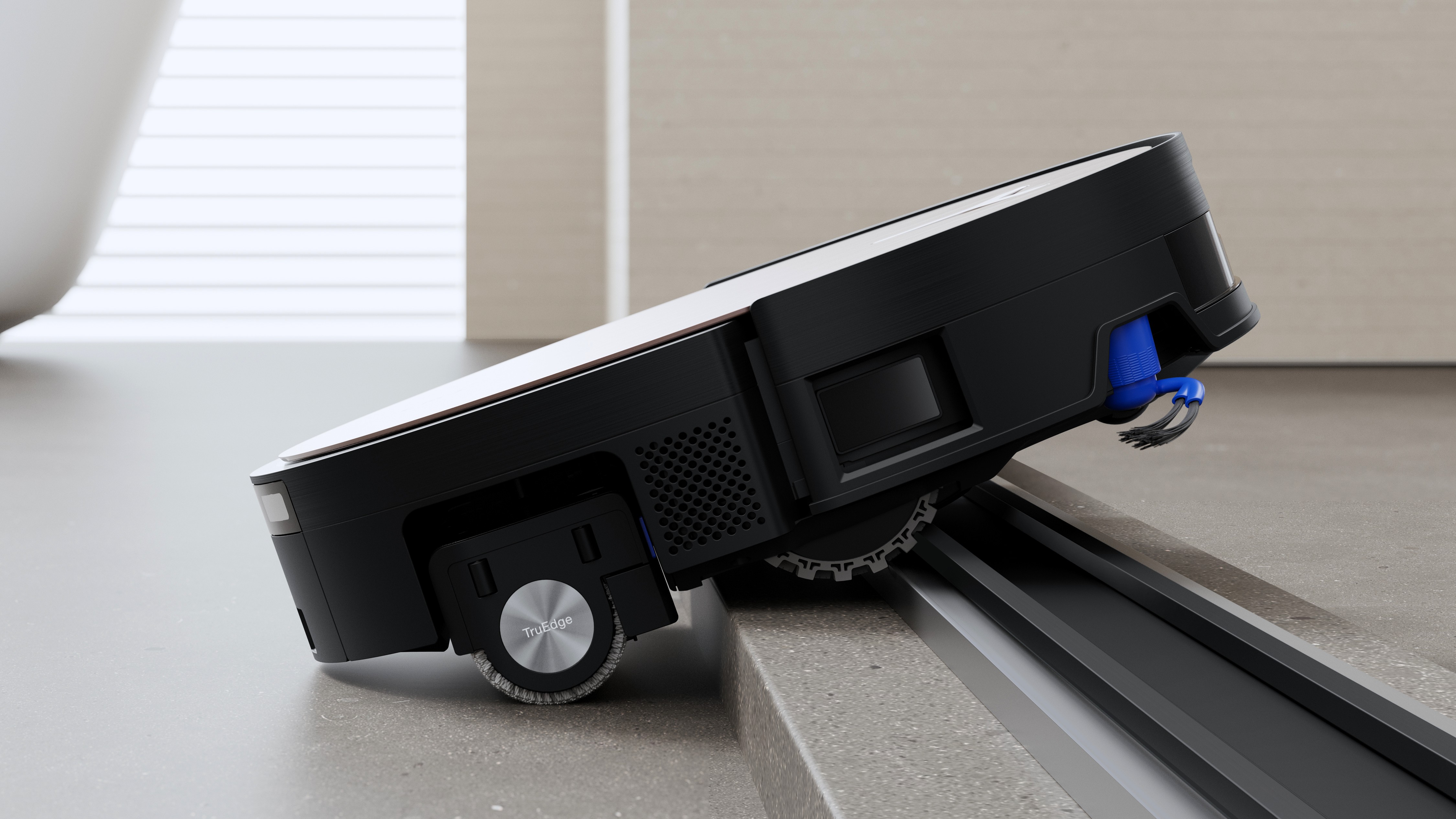 Ecovacs Deebot X11 Omnicyclone voyageant en bas